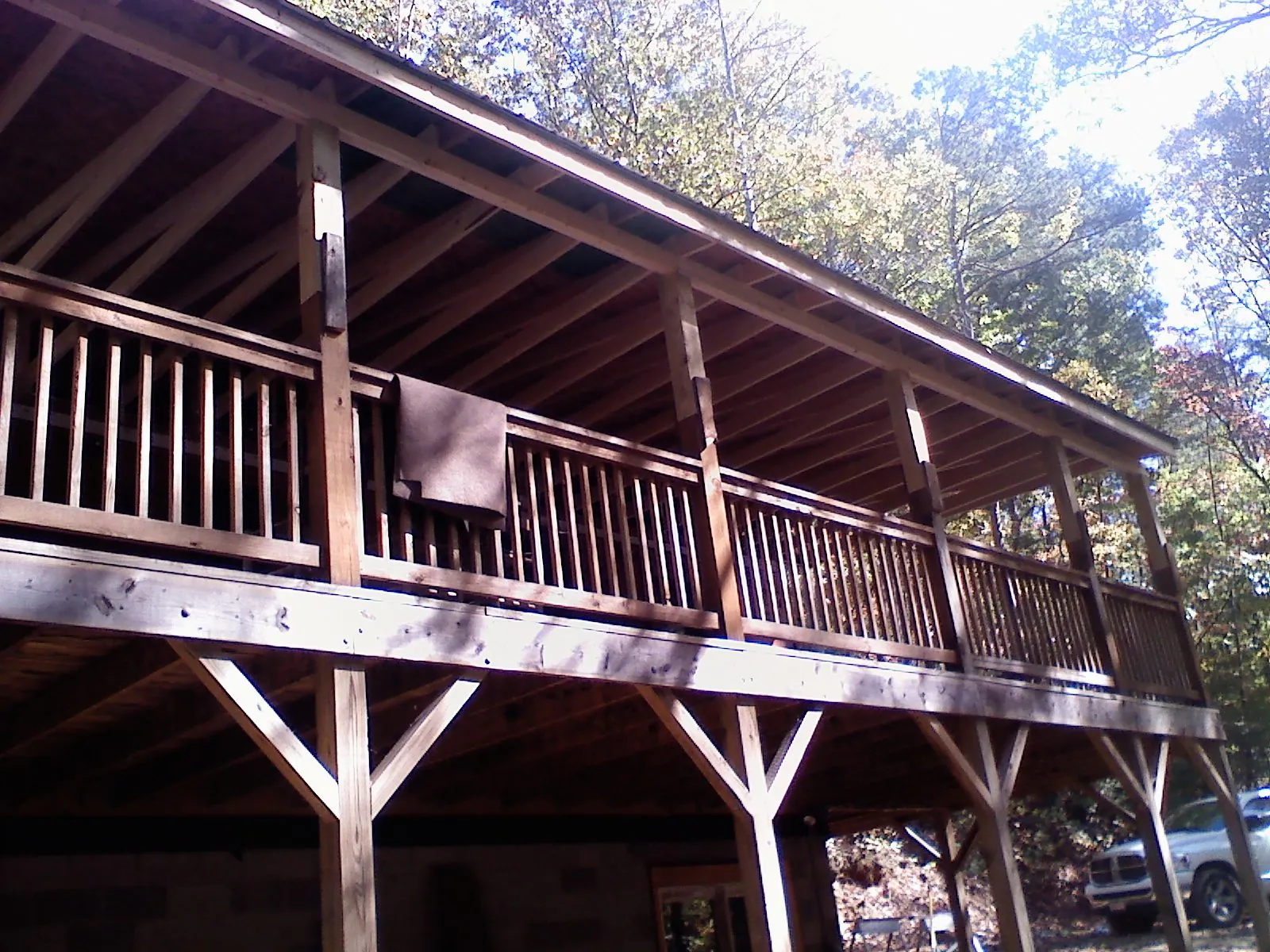 Timber framing under a new elevated porch and deck — Roof Leak Repair in Denton by Roofing Brothers